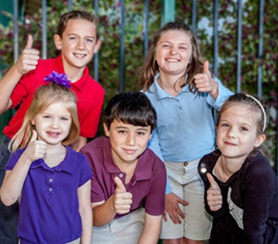 PotentialKCS KCS kids giving a thumbs up